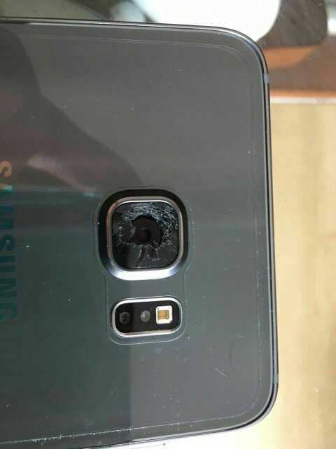 三星手机后面玻璃碎了,怎么办。 照相功能比以