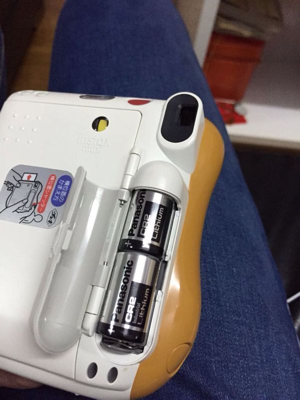 请问这是什么型号的拍立得,电池没电了在哪可