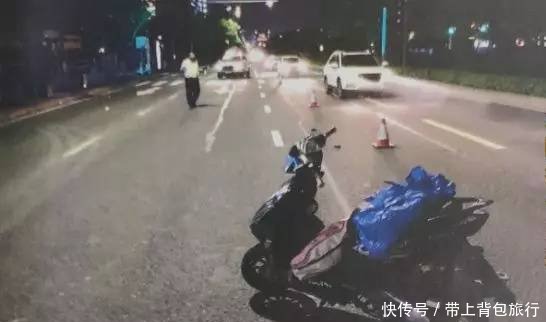 女子走路闯红灯撞上摩托车造成乘客死亡,女子