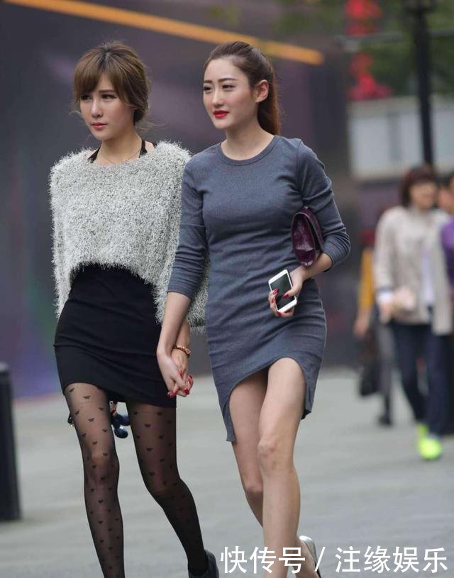 街拍街头面的性感,美女时尚,丝袜十足!性感女神放在把魅力外胸图片