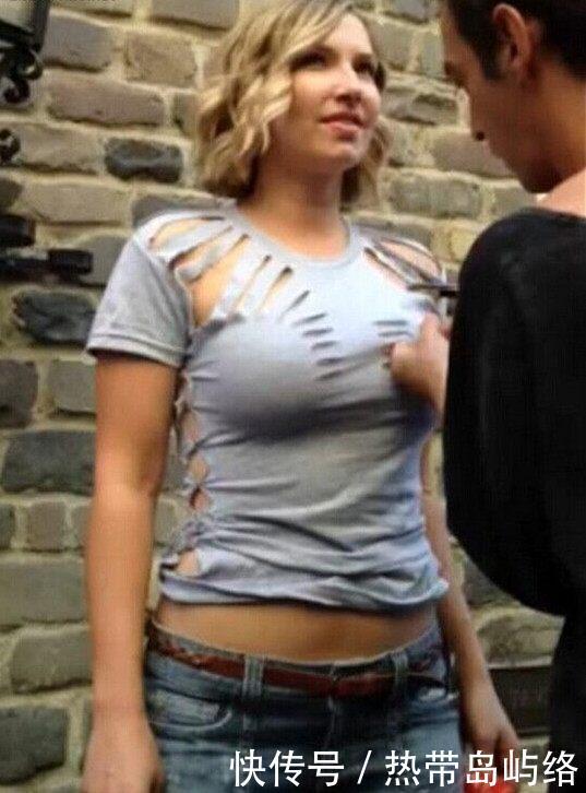 国外男子当街剪开美女衣服,路人停足观看默不作声