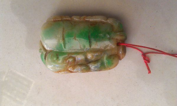 请问老师我这个是玉石是什么品质,图像,年代及