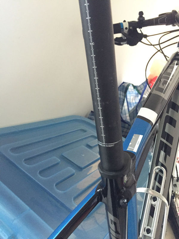 请问捷安特四公主座垫杆上最下面那条线是高度