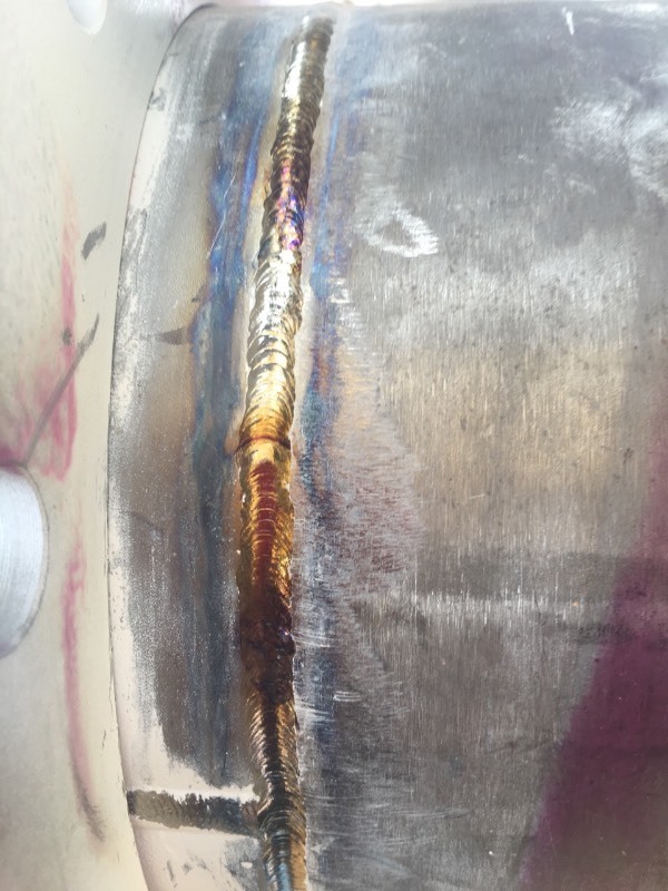 钛管焊接,质询下焊接质量,大神来。中间一张是