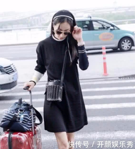 韩雪现身机场,意外发现鞋子是用胶带做的,还能