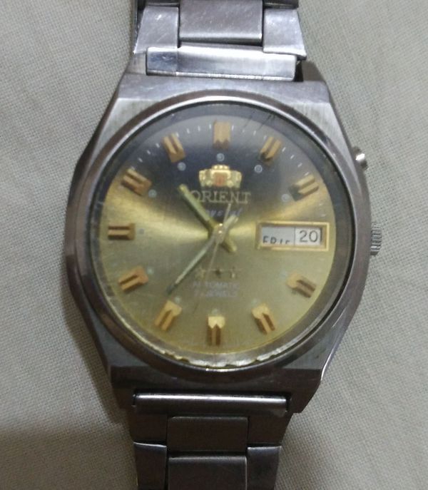 我有一块日本东方双狮表,手表后盖型号 TT L46