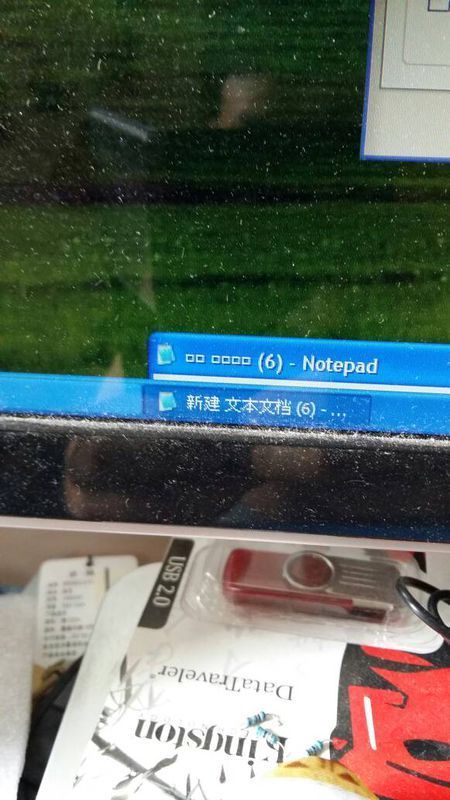 为什么我的电脑装了英文的XP中文乱码,但部分
