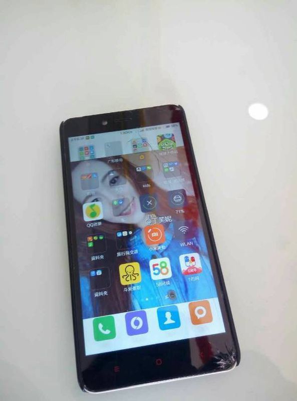 手机红米note2掉地爆屏了,请问换内外屏要多少